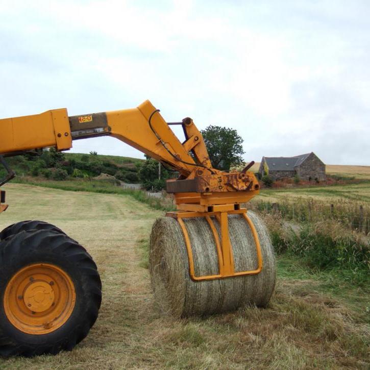 Wrapped Bale Clamp for handing wrapped silage bales.